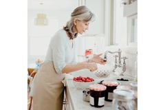 Elderly woman cooking